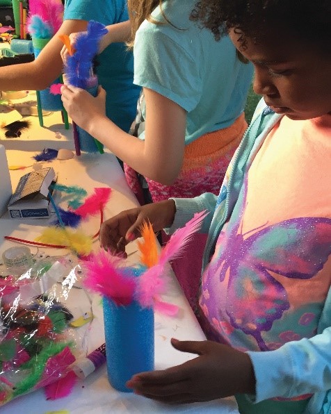 A kiddo doing an experiment